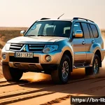 Home 18 리비아에서 사용되는 주요 차량 브랜드 - A robust and durable Mitsubishi Pajero SUV driving on a rugged, dusty Libyan desert road under inten...